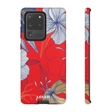 Loulii Blossom™ phone case that shows elegant flowers in white  with a red background