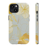 Loulii Blossom™ phone case that shows elegant flowers in white and gold with a gray background
