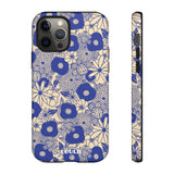 Loulii Blossom™ phone case that shows elegant flowers in blue and crème