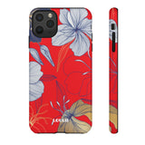 Loulii Blossom™ phone case that shows elegant flowers in white  with a red background
