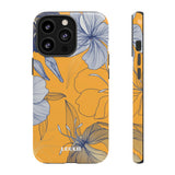 Loulii Blossom™ phone case that shows elegant flowers in white with a yellow background