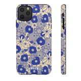Loulii Blossom™ phone case that shows elegant flowers in blue and crème