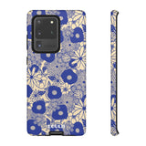 Loulii Blossom™ phone case that shows elegant flowers in blue and crème