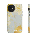 Loulii Blossom™ phone case that shows elegant flowers in white and gold with a gray background