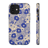 Loulii Blossom™ phone case that shows elegant flowers in blue and crème