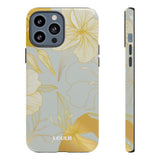 Loulii Blossom™ phone case that shows elegant flowers in white and gold with a gray background