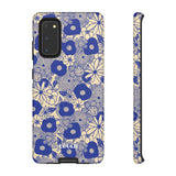 Loulii Blossom™ phone case that shows elegant flowers in blue and crème