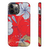 Loulii Blossom™ phone case that shows elegant flowers in white  with a red background