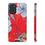 Loulii Blossom™ phone case that shows elegant flowers in white  with a red background