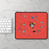 LouliiBot™ Space Friends Gaming Mouse Pad in red next to a keyboard