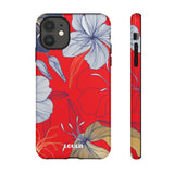 Loulii Blossom™ phone case that shows elegant flowers in white  with a red background