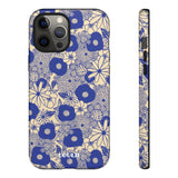 Loulii Blossom™ phone case that shows elegant flowers in blue and crème