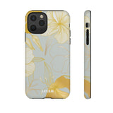 Loulii Blossom™ phone case that shows elegant flowers in white and gold with a gray background