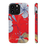 Loulii Blossom™ phone case that shows elegant flowers in white  with a red background