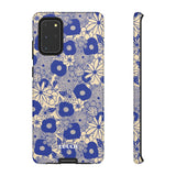 Loulii Blossom™ phone case that shows elegant flowers in blue and crème