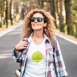 Lady with sunglasses walking down the road wearing a Loulii design Say something white t-shirt