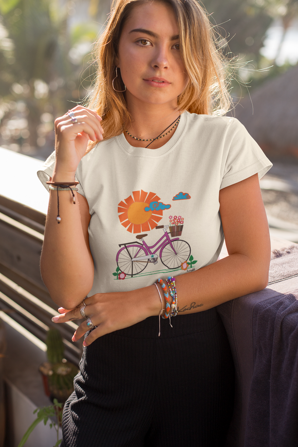 Young women standing leaning on a banister wearing a Bike Ride Organic T-shirt in natural