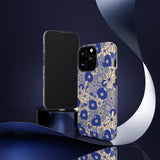 Loulii Blossom™ phone case that shows elegant flowers in blue and crème on a stand showing front and back