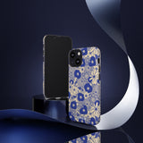 Loulii Blossom™ phone case that shows elegant flowers in blue and crème