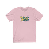 Unique Tee that shows a seventies funky yellow color print of the word  Unique in the color light pink