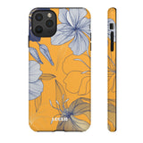 Loulii Blossom™ phone case that shows elegant flowers in white with a yellow background