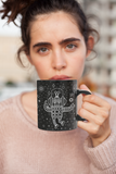 Young women holding a LouliiBot™ Space Friends Mug