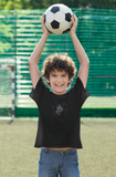Boy with LouliiBot™ Robo2 T-shirt holding a soccer ball over his head